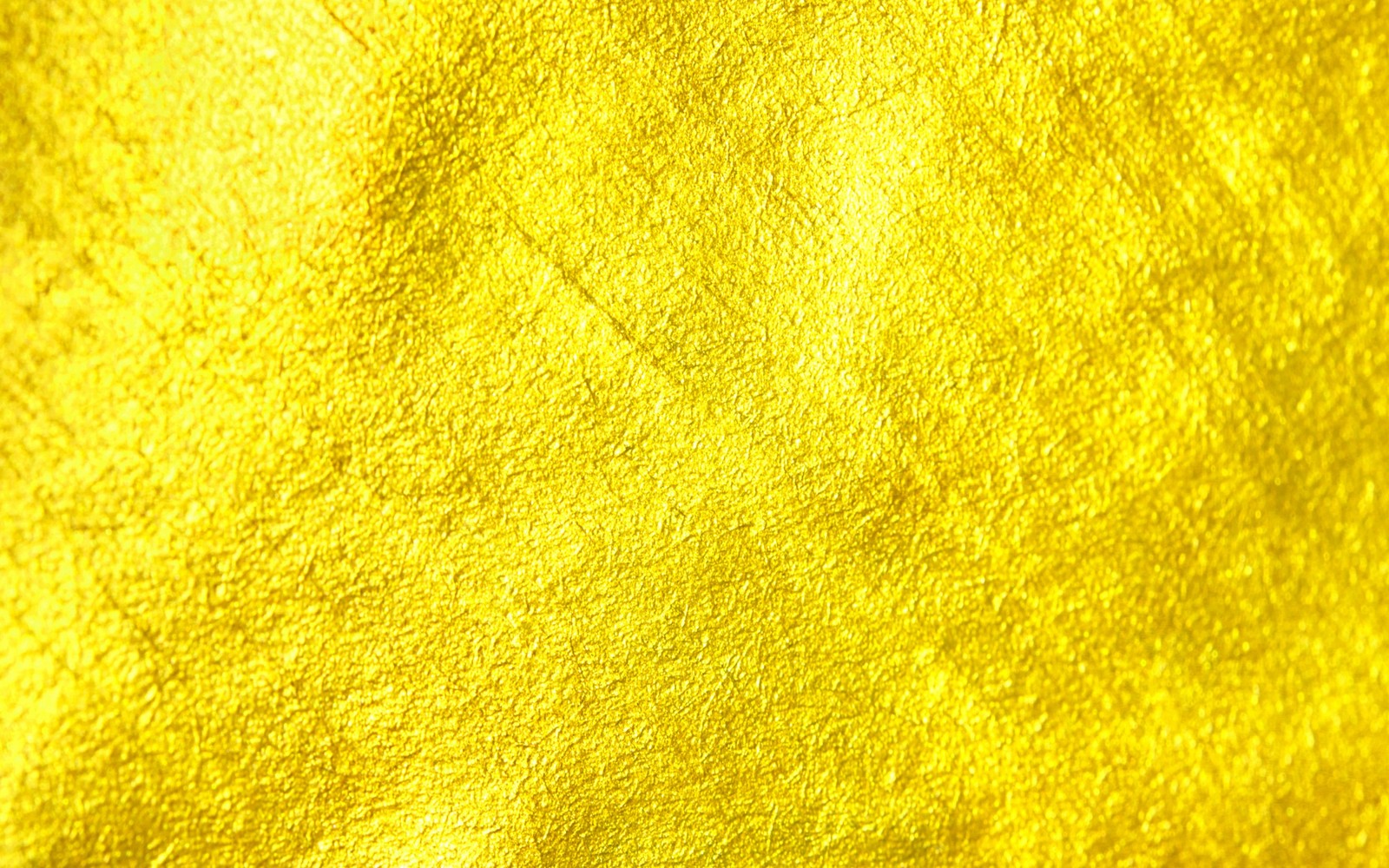 Gros plan d'un tissu jaune sur fond noir (texture, or, jaune, orange, motif)