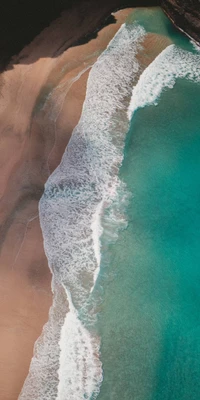 Tranquil Seashore with Gentle Waves and Sandy Beach