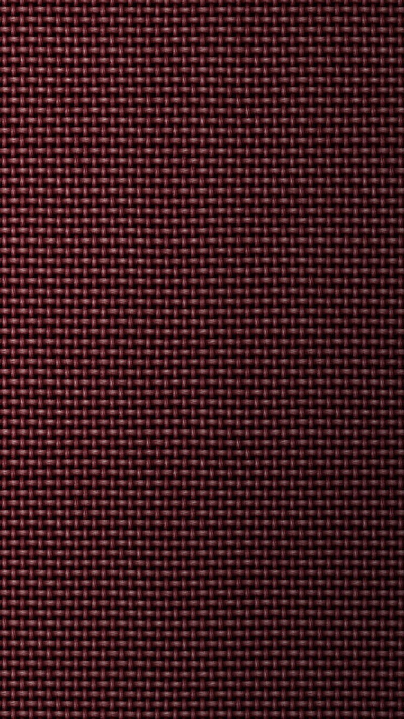 Un primer plano de un fondo rojo con un patrón (nudo, textura)