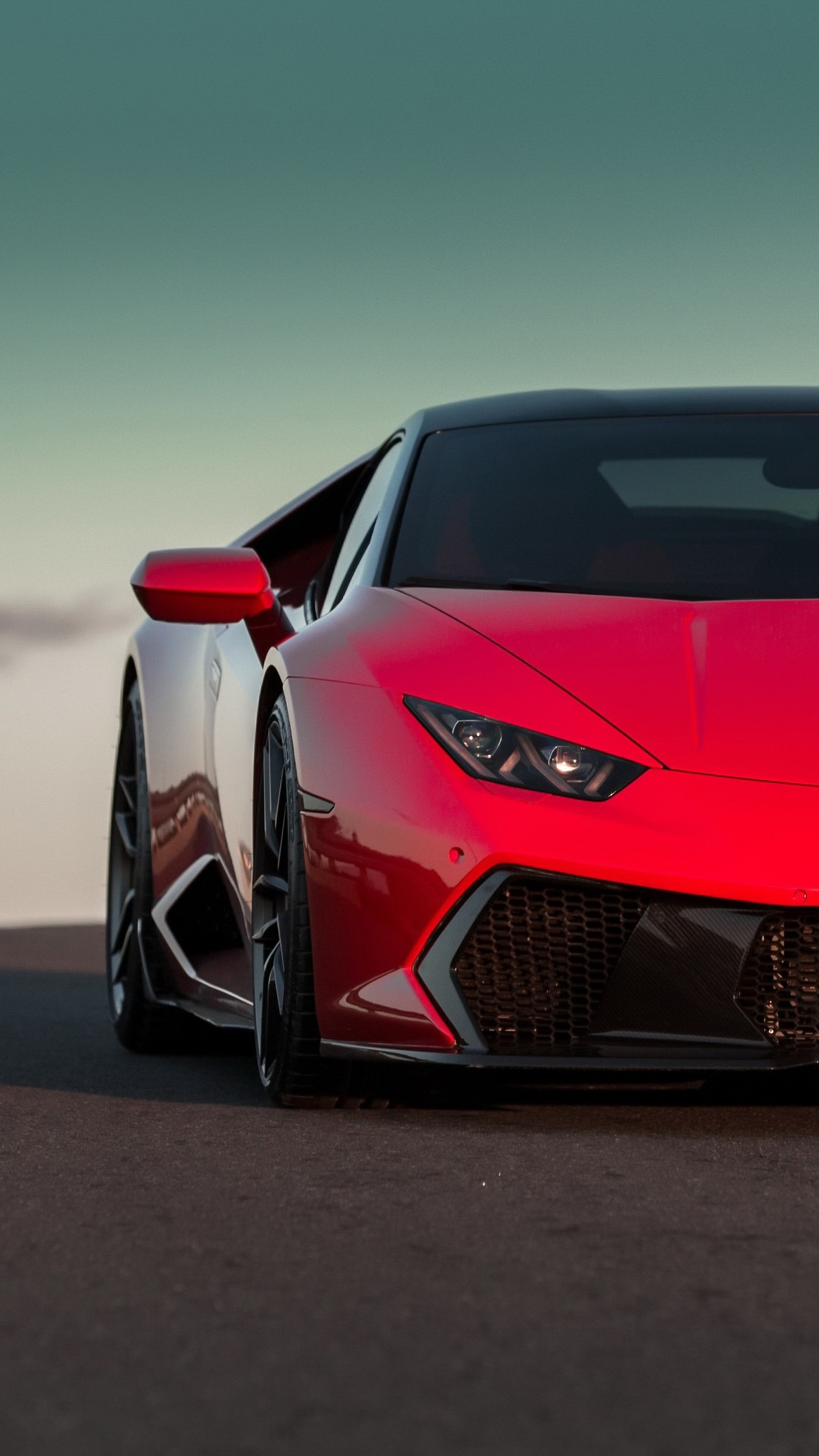 A close up of a red sports car on a road (lamborghini, cars, lamborghini gallardo, lamborghini aventador, sports car)