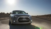 Hyundai Mid-Size Car with Turbocharger on Open Road Under Clear Sky