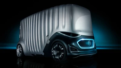 Futuristic Mercedes-Benz concept van with a sleek, aerodynamic design, featuring innovative lighting and alloy wheels.