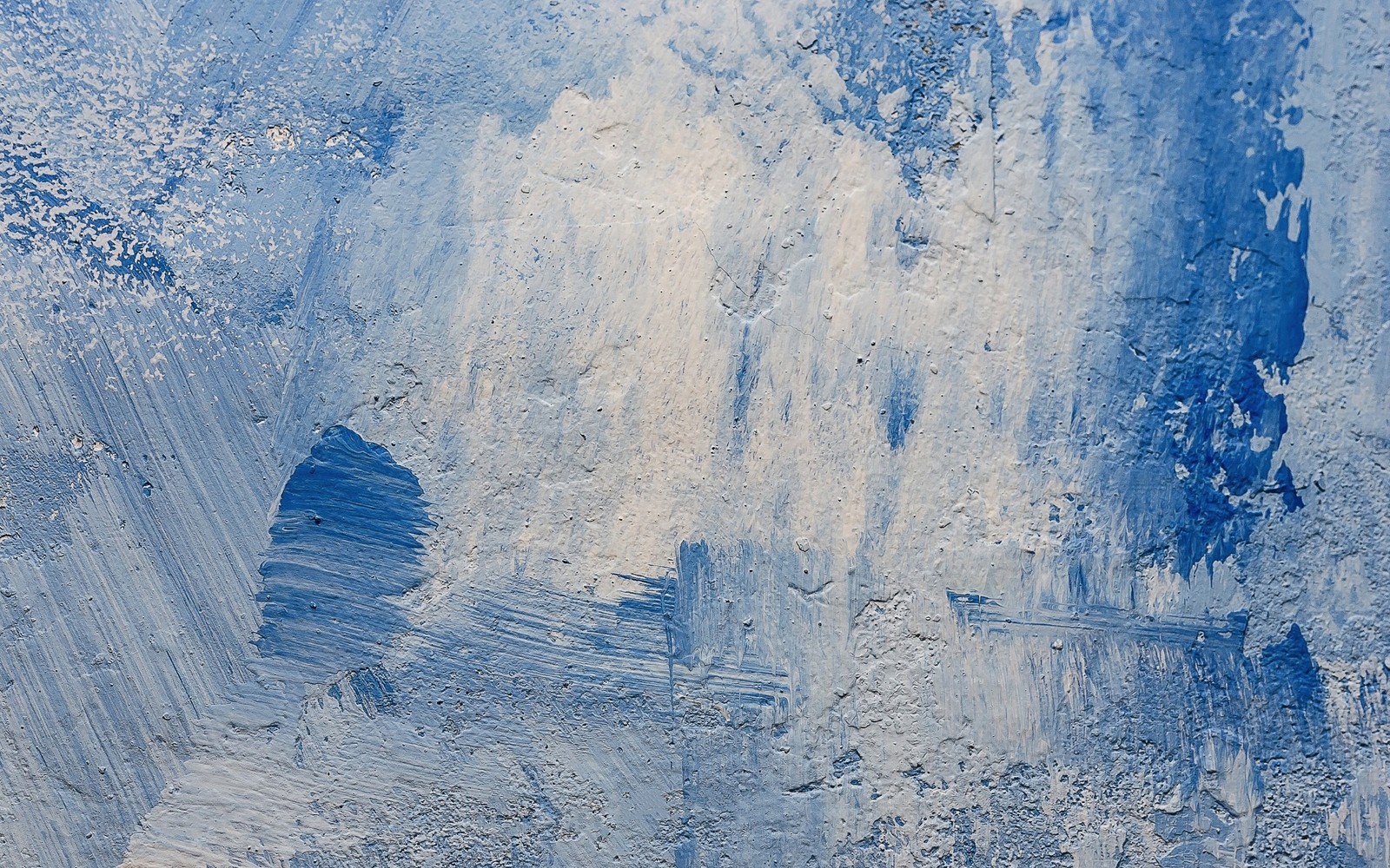 Arafed blue and white paint on a wall with a black and white umbrella (frost, blue, water, freezing, ice)