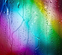 Colorful droplets on a vibrant, gradient background.