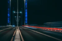 Illuminated Highway Bridge at Night