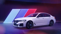 2021 BMW 530i M Sport Carbon Edition in a striking display with dynamic lighting.