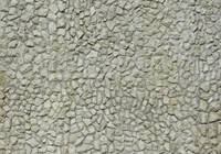 Textured Stone Wall with Varied Gravel Patterns