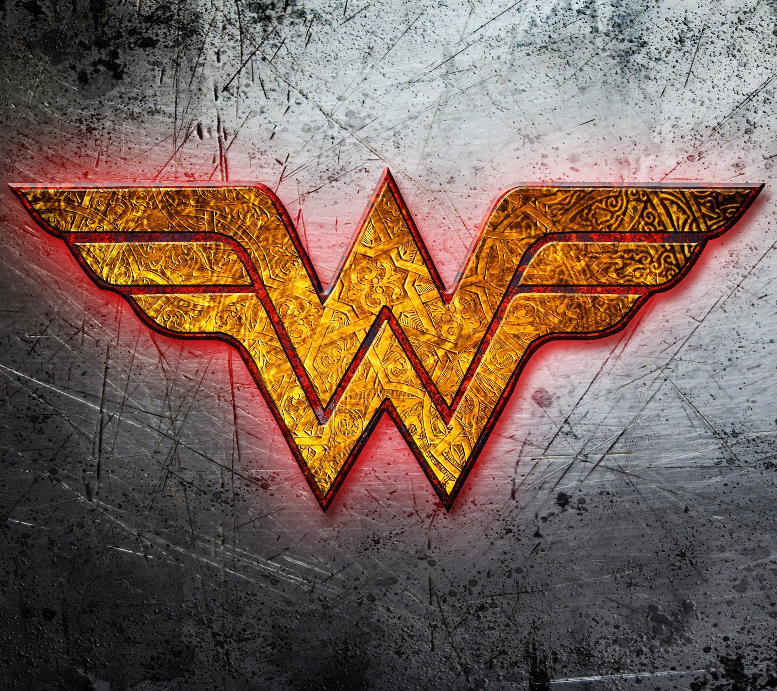 Un gros plan d'un logo wonder sur une surface métallique (batman, superman, wonder woman)