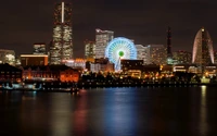 Paisagem noturna de Yokohama: Arranha-céus e reflexos à beira-mar