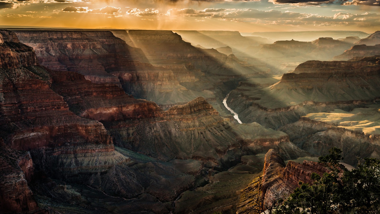 Uma vista de um cânion com um rio passando por ele (badlands, cânion, geologia, formação, parque nacional)