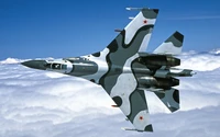 Avion de chasse Su-30MKK en vol au-dessus des nuages