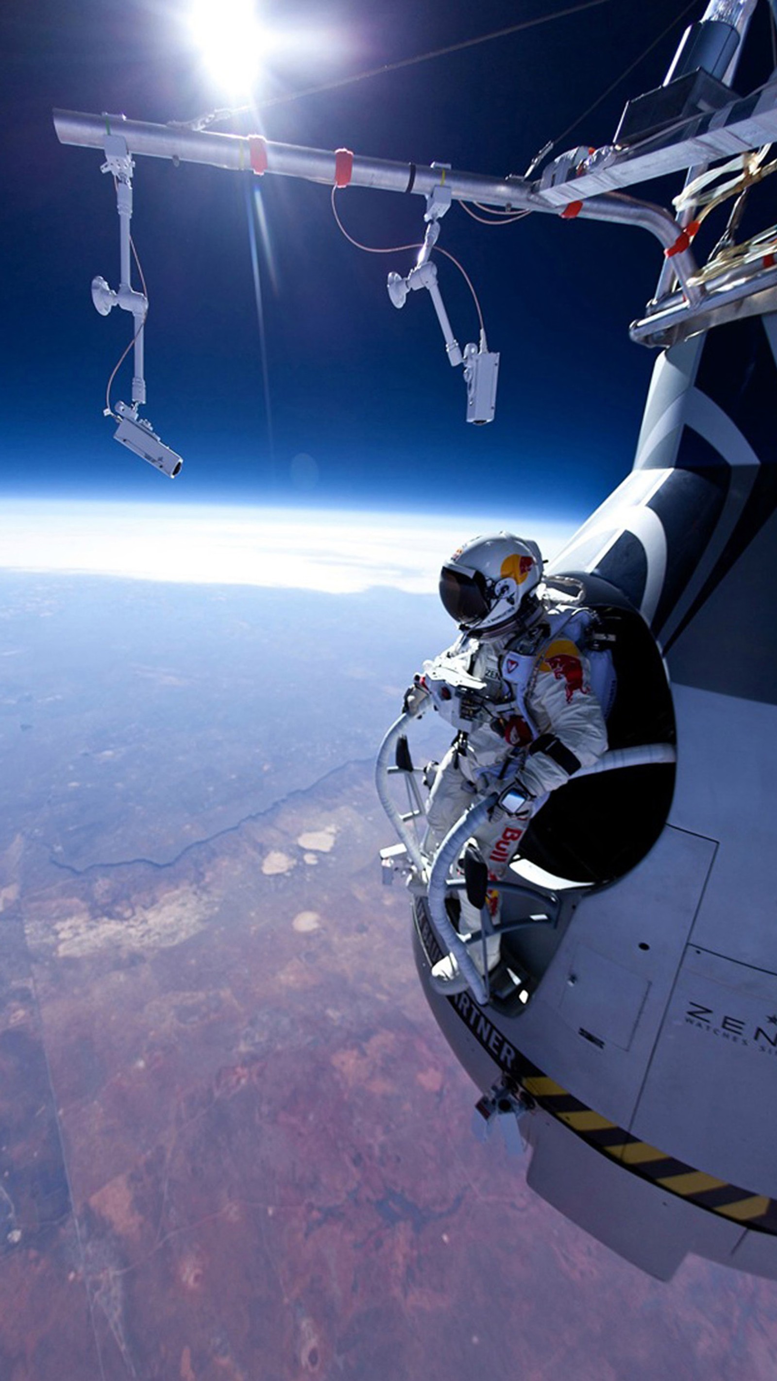 Arafed astronaut in a space suit is suspended from a space station (fghj, sfd)