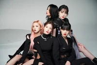 Enchanting Unity: GIDLE's Powerful Presence in Stylish Black Attire