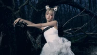 Eunchae from LE SSERAFIM poses elegantly in a whimsical white dress, surrounded by a dark, enchanted forest, embodying the ethereal "featherly lotus" concept.