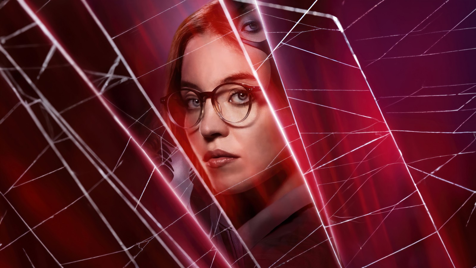 A woman in glasses and a suit is behind a spider web (madame web, movie, marvel, sydney sweeney)