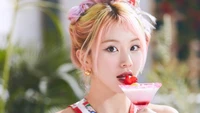 Chaeyoung of TWICE enjoying a colorful cocktail from the "Taste of Love" album.