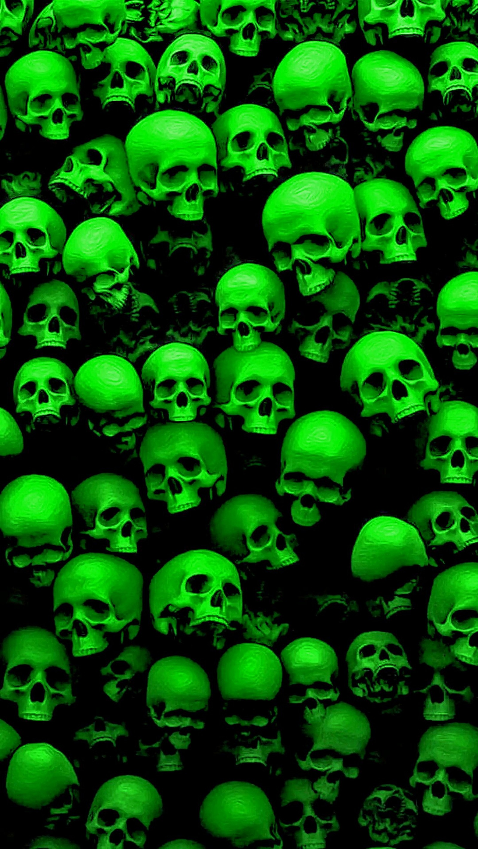 A close up of a bunch of skulls with green lights (demons, skulls, spiritual)