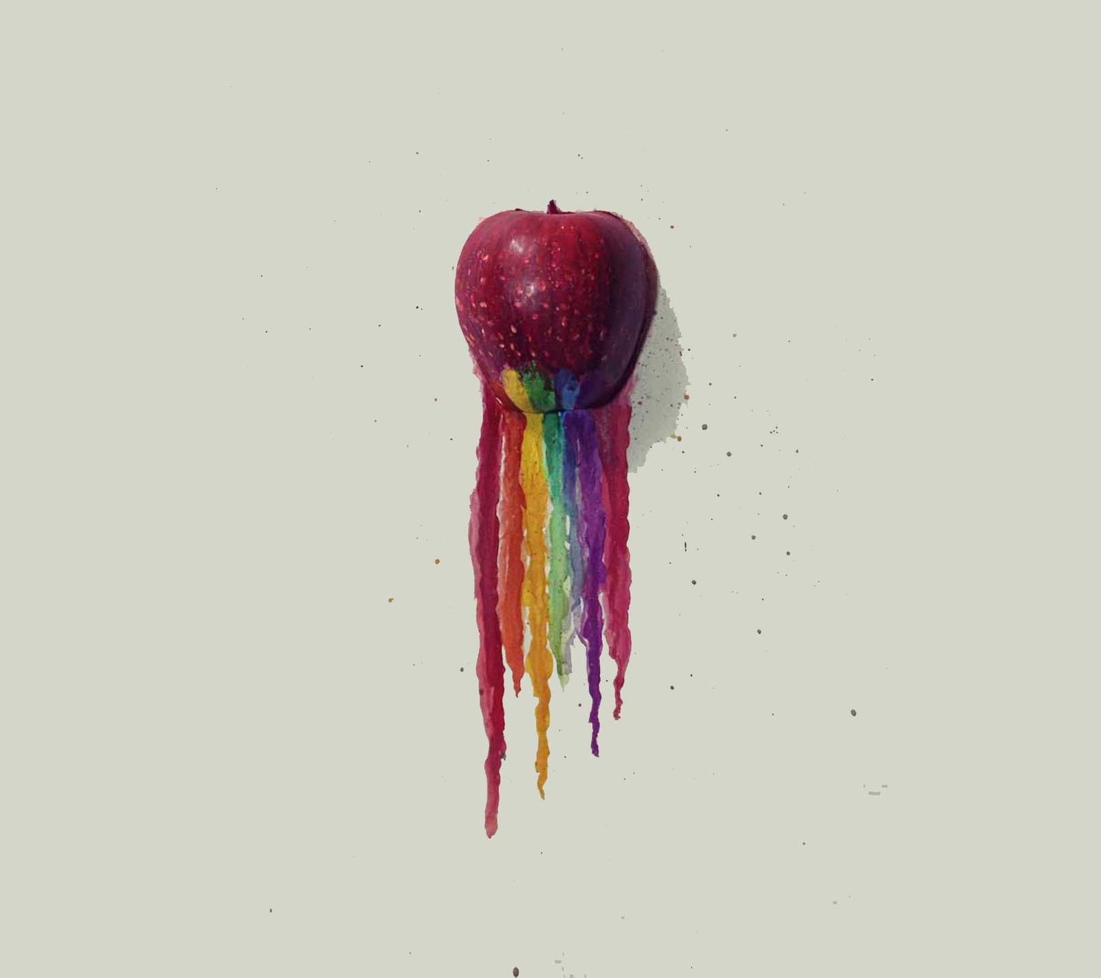 There is a heart shaped object with a rainbow dripping from it (apple, paint)