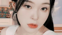 Gahyeon from Dreamcatcher, showcasing ethereal beauty with striking eyes and glossy lips, evoking themes of hope and resilience.