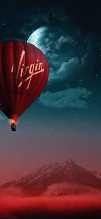 Majestic Hot Air Balloon Gliding Over a Serene Landscape Under a Starry Sky