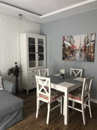 Modern Dining Area with White Furniture and Elegant Decor