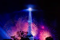 Eiffel Tower Illuminated by Spectacular Fireworks on Bastille Day Night in Paris