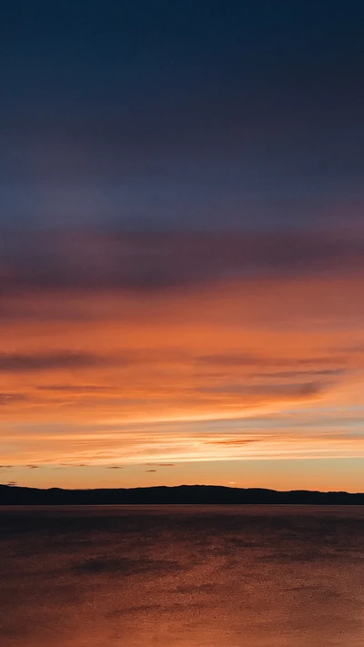 Golden Sunset Over a Serene Fjord in Norway