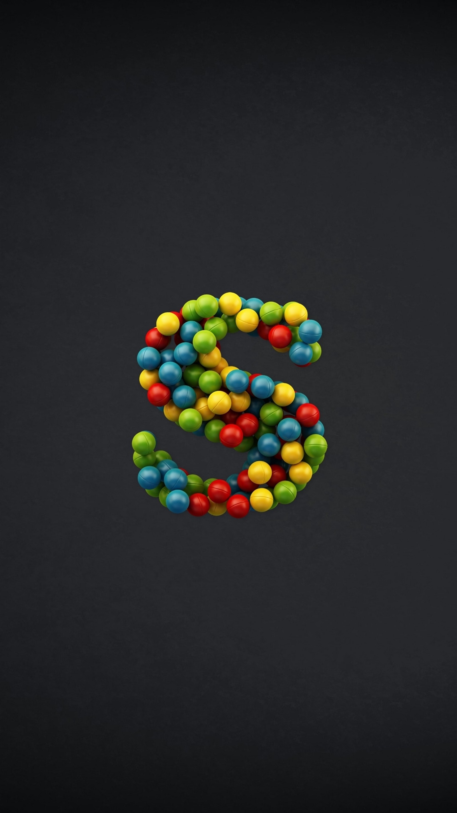 A close up of a number made of colorful candy balls (balls, colours)