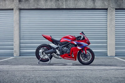 2024 Honda CBR650R: Sleek Red Sports Touring Bike in Urban Setting