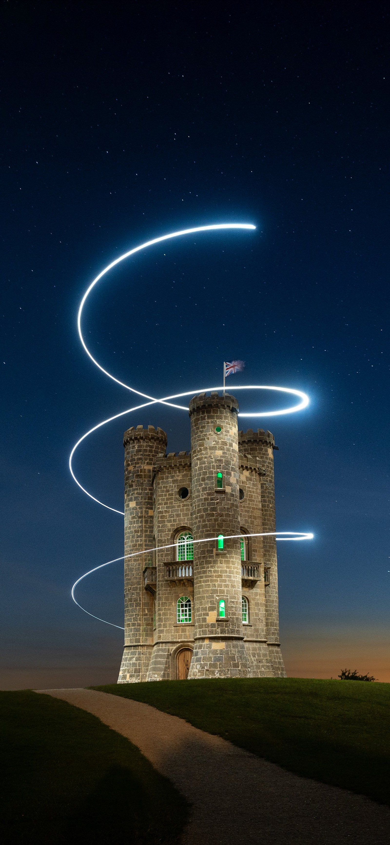 Arafed image of a castle with a long exposure of light trails (tower, light painting, painting, light, building)