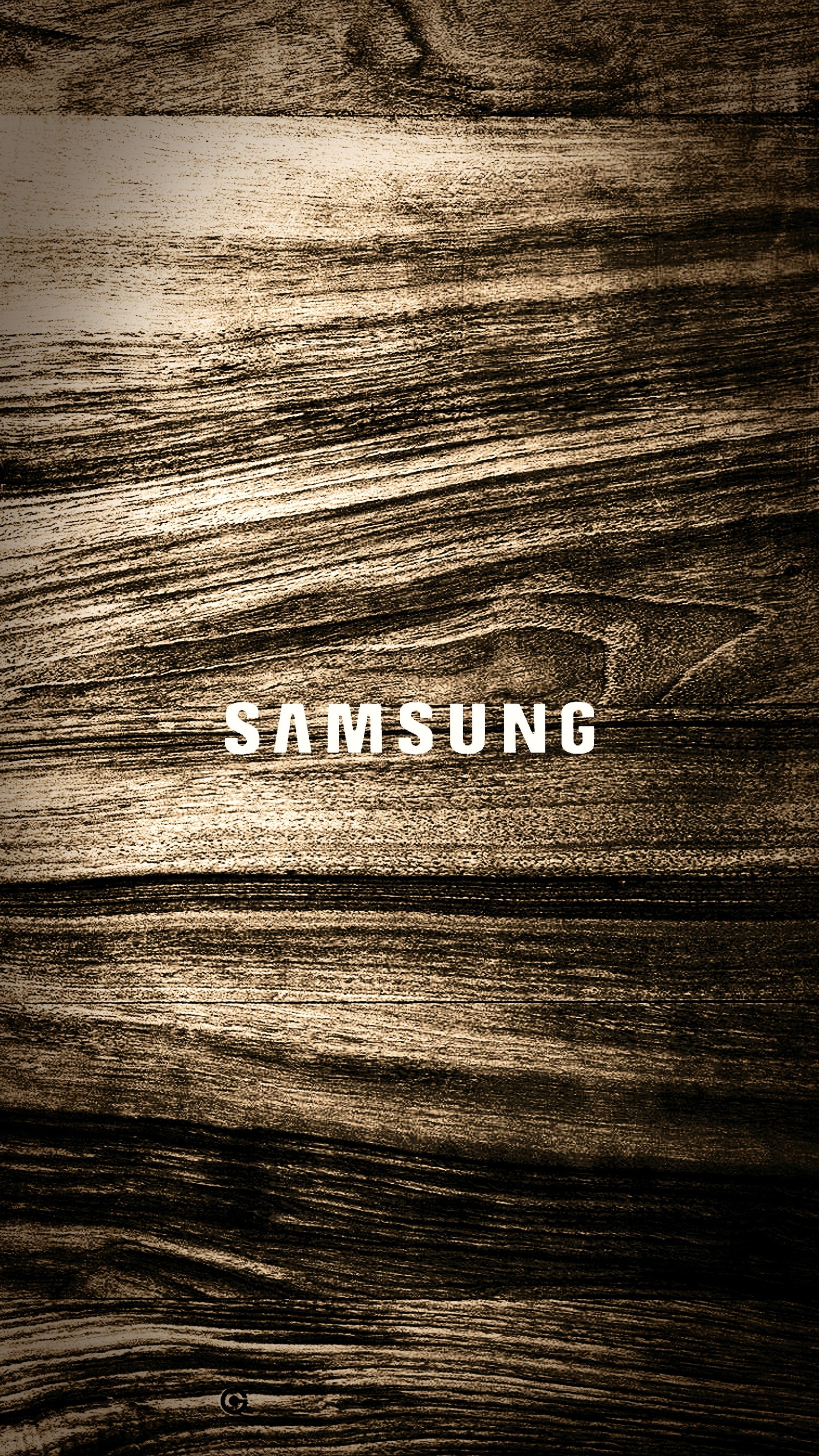 Um close de um logotipo da samsung em uma superfície de madeira (samsung, sépia, madeira)