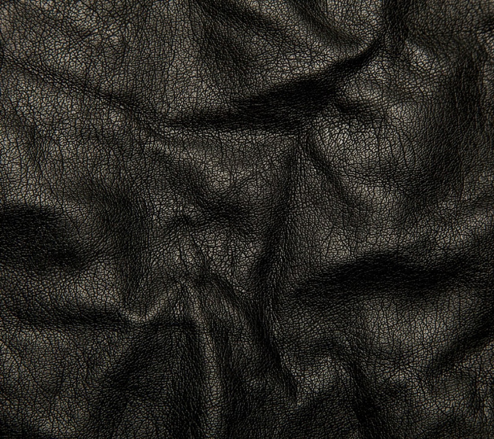 A close up of a black leather material with a white background (abstract, black, class, galaxy, leather)