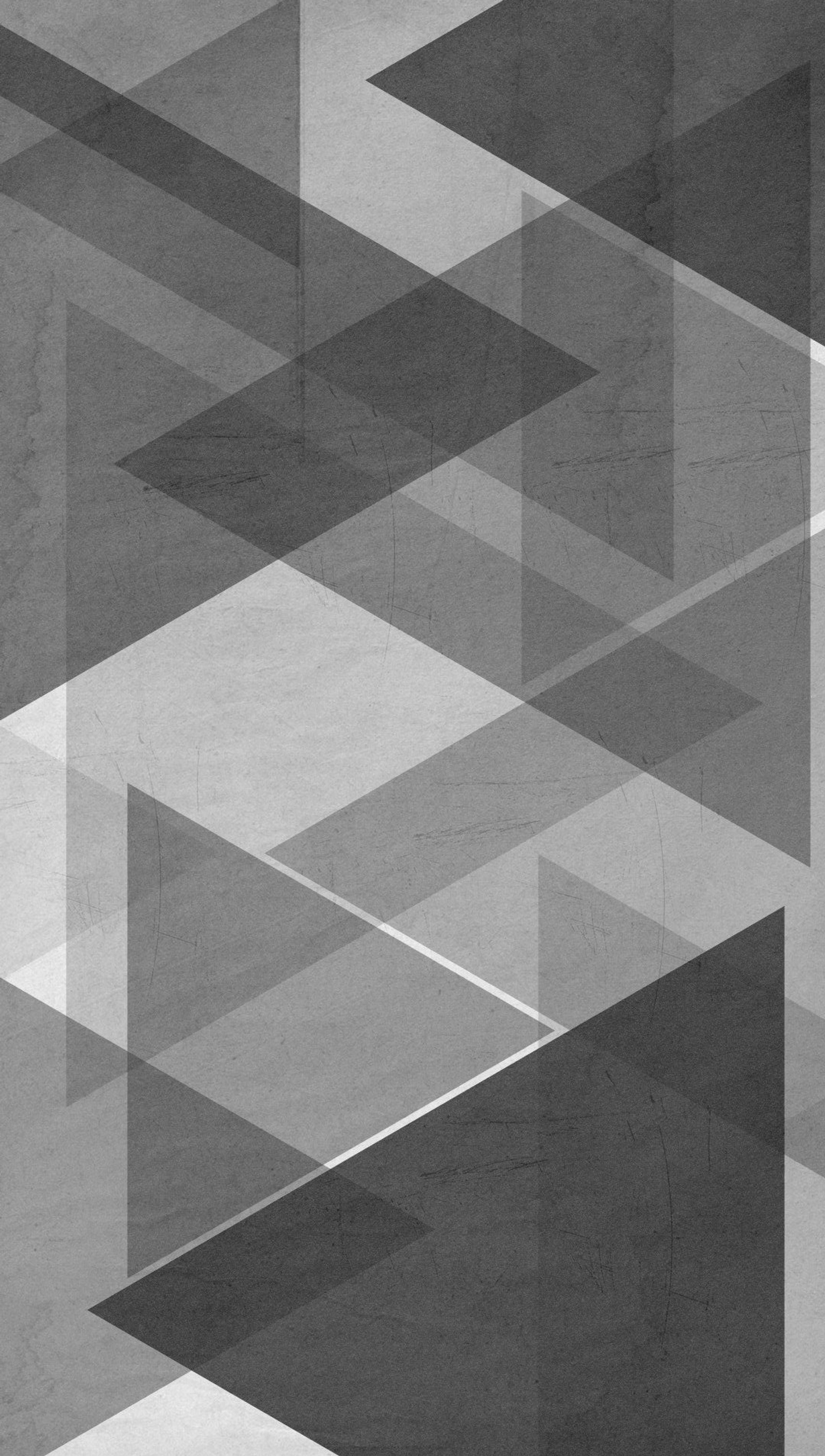 A close up of a black and white photo of a wall with geometric shapes (abstract, grey)