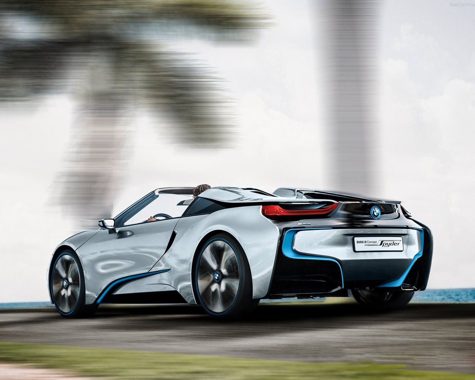 Bmw i8 roadsee concept car driving on a road near a palm tree (automobile, bawarian, bmw, concept, i8)