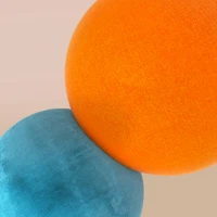 Vibrant Citrus-Inspired Art: Electric Blue and Tangerine Spheres