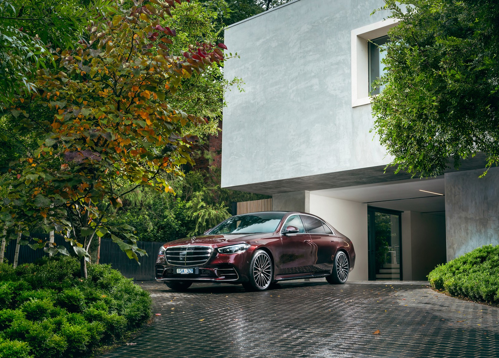 A red mercedes parked in front of a modern house (mercedes benz s 450 4matic amg line, luxury sedan, 2021, cars, 4k wallpaper)