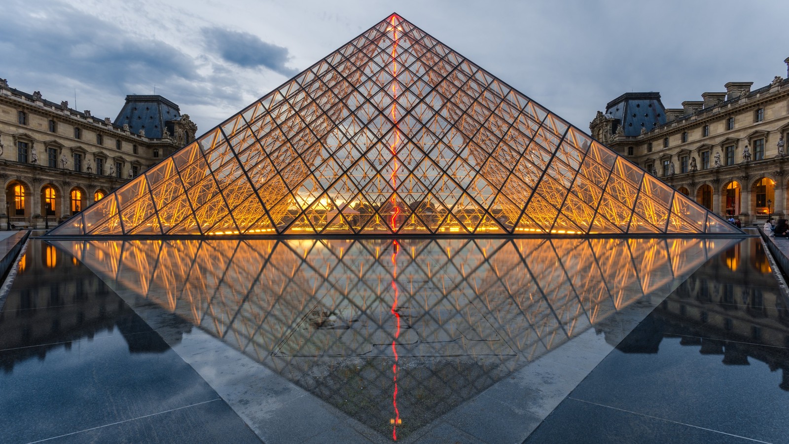 A large pyramid shaped building with a reflection in the water (louvre, reflection, pyramid, architecture, landmark)