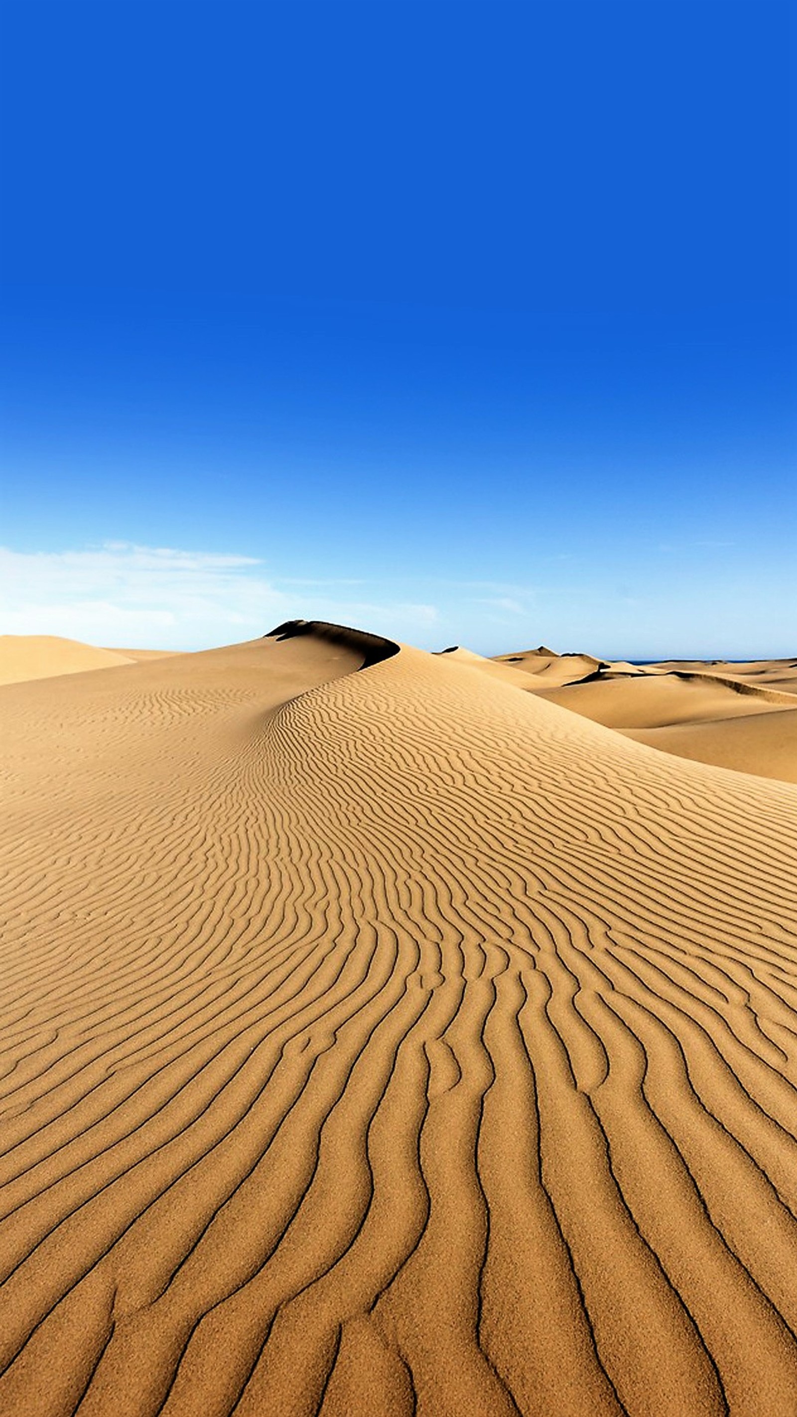 Arafed sand dunes with a blue sky and a few clouds (blue, desert, nature, sand, sky)