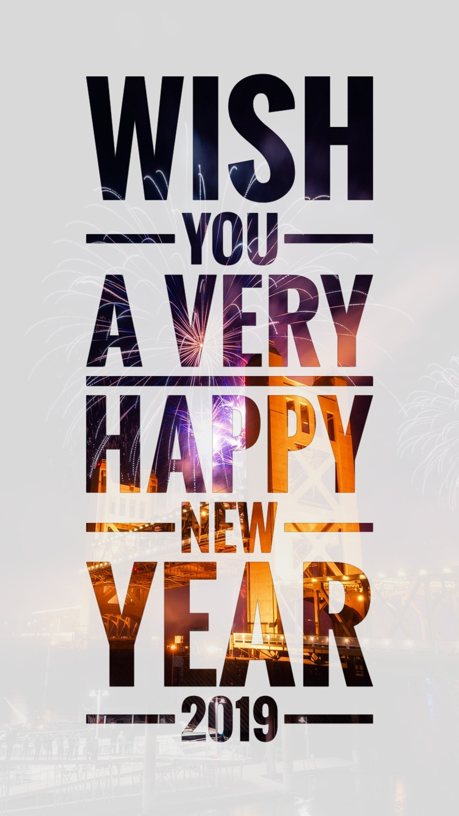 A close up of a poster with fireworks in the background (wishes, newyear19, 2019, love, best)