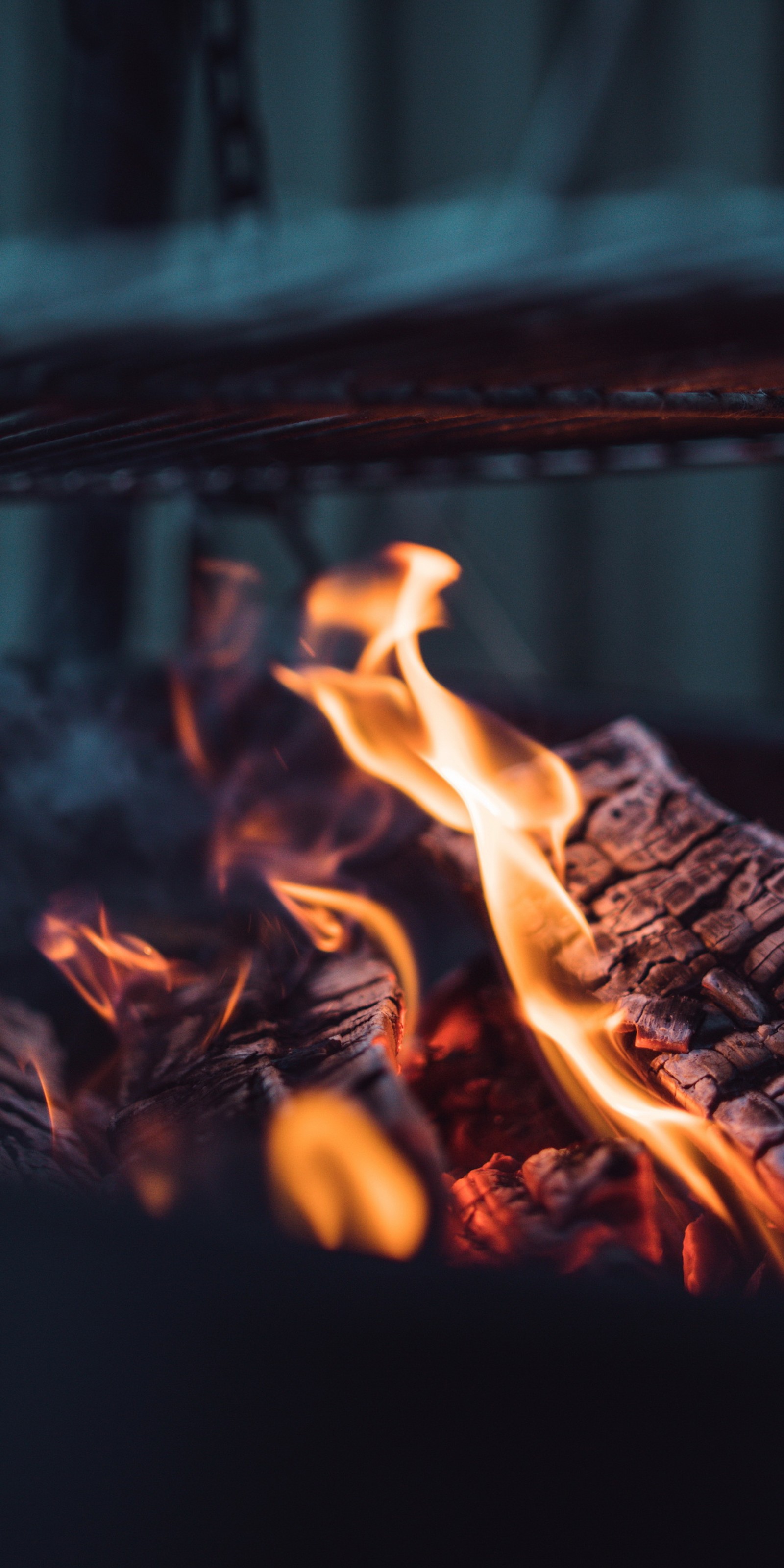 Flames are lit in a grill with a grill top (fire, flame, heat, gas, fireplace)