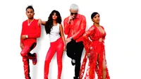 Selena Gomez and Friends in Bold Red: A Fashionable Reggaeton Celebration