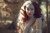 Enchanting Portrait of a Woman in Nature with Golden Hair and Soft Light