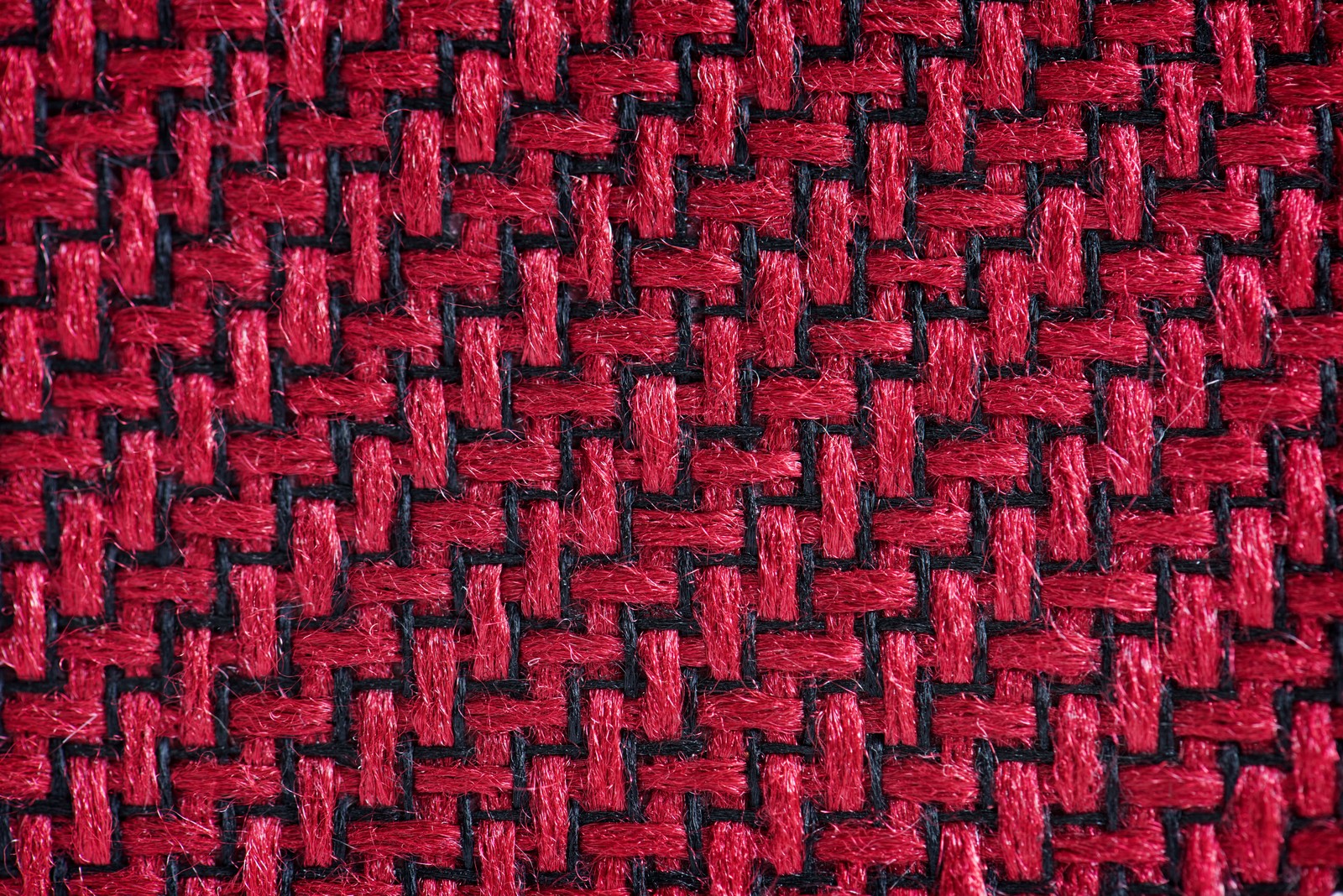 Un gros plan d'un tissu tissé rouge et noir (textile, rouge, motif, symétrie, maçonnerie)