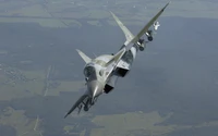 Caza MiG-29K en vuelo sobre un paisaje escénico