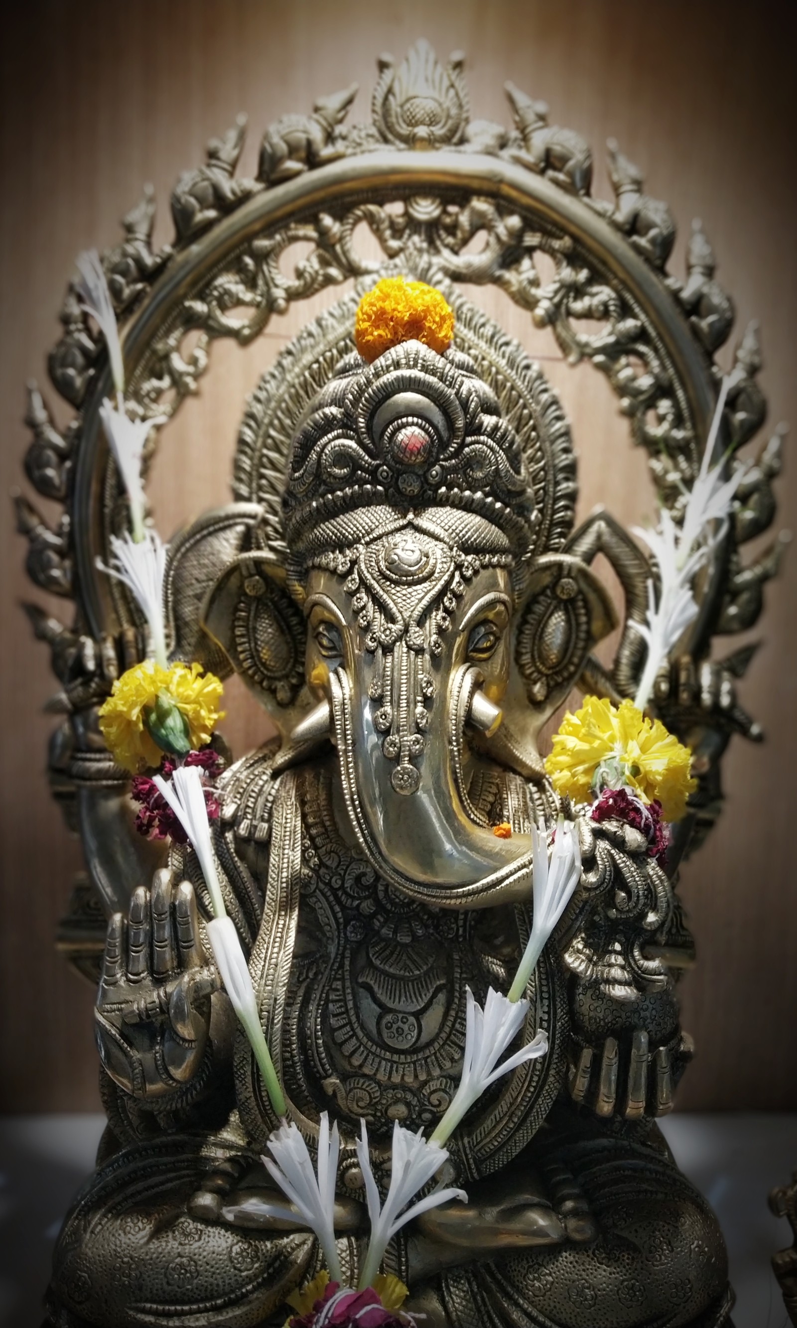 There is a statue of an elephant with flowers on it (art, best, best 2019, devotional, flower)