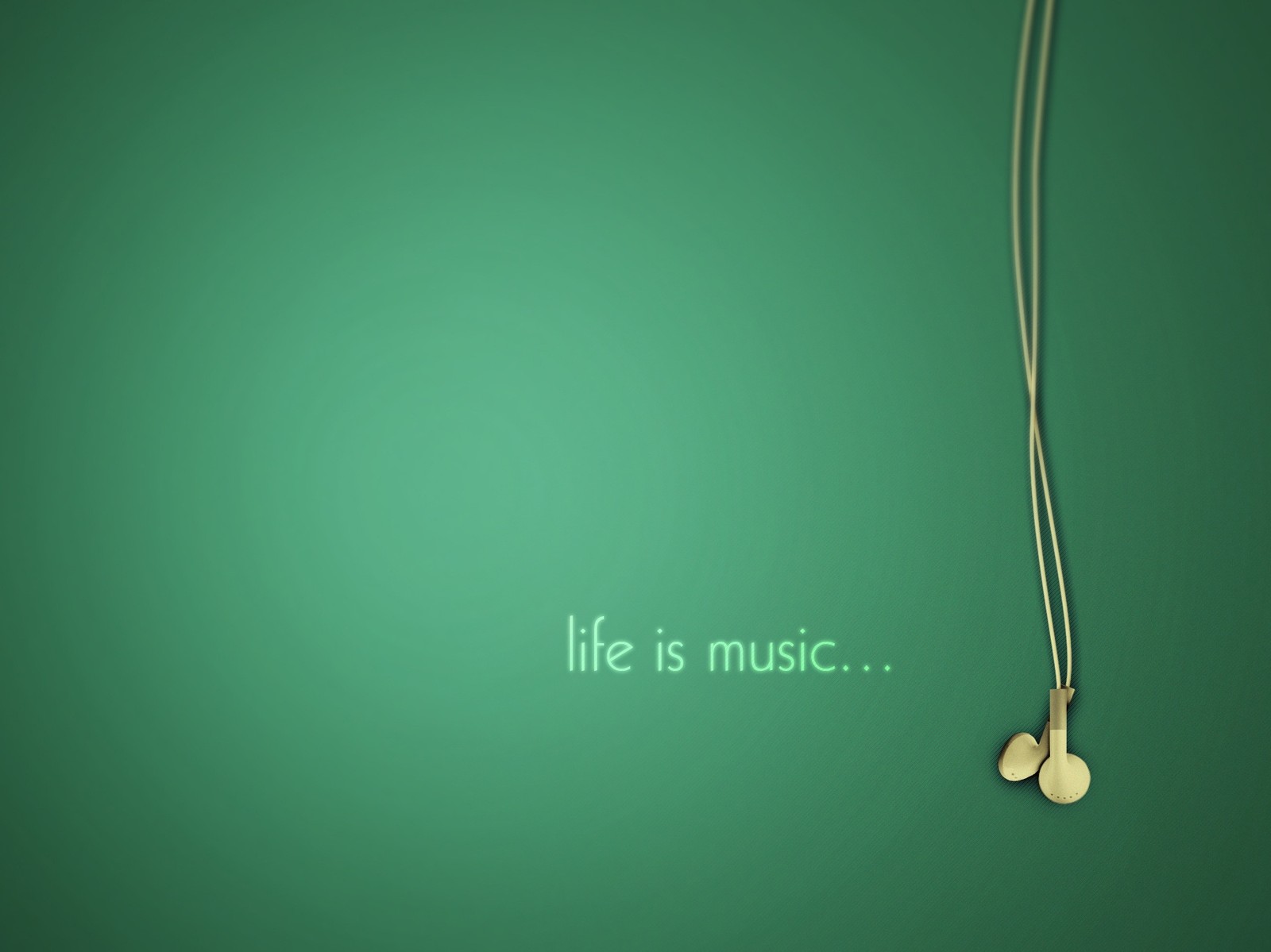 There is a green wall with a gold necklace and a quote (cables, green, headphones, life, music)