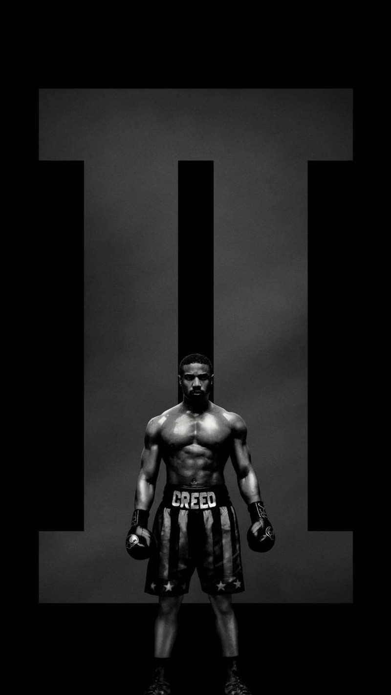 Черно-белое фото мужчины в боксерском снаряжении (creed2, рокки, rocky, adonis creed)