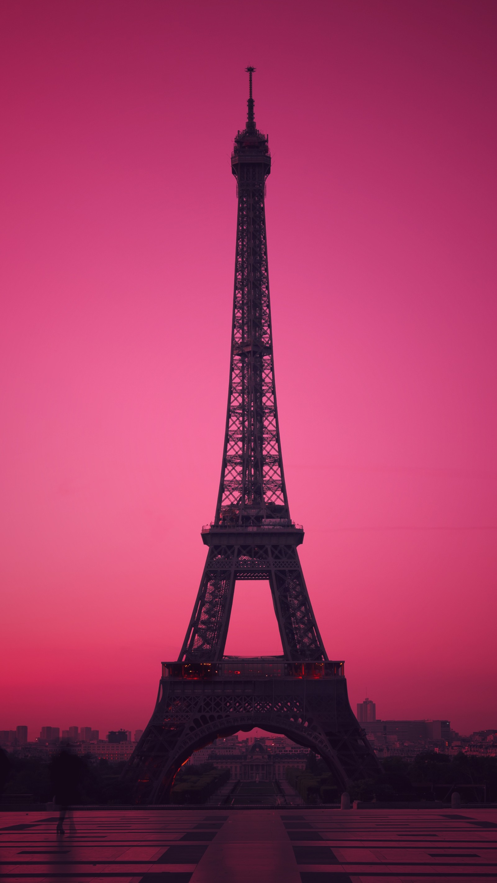 Arafed view of the eiffel tower at sunset with a pink sky (landscape, sunset, tower)