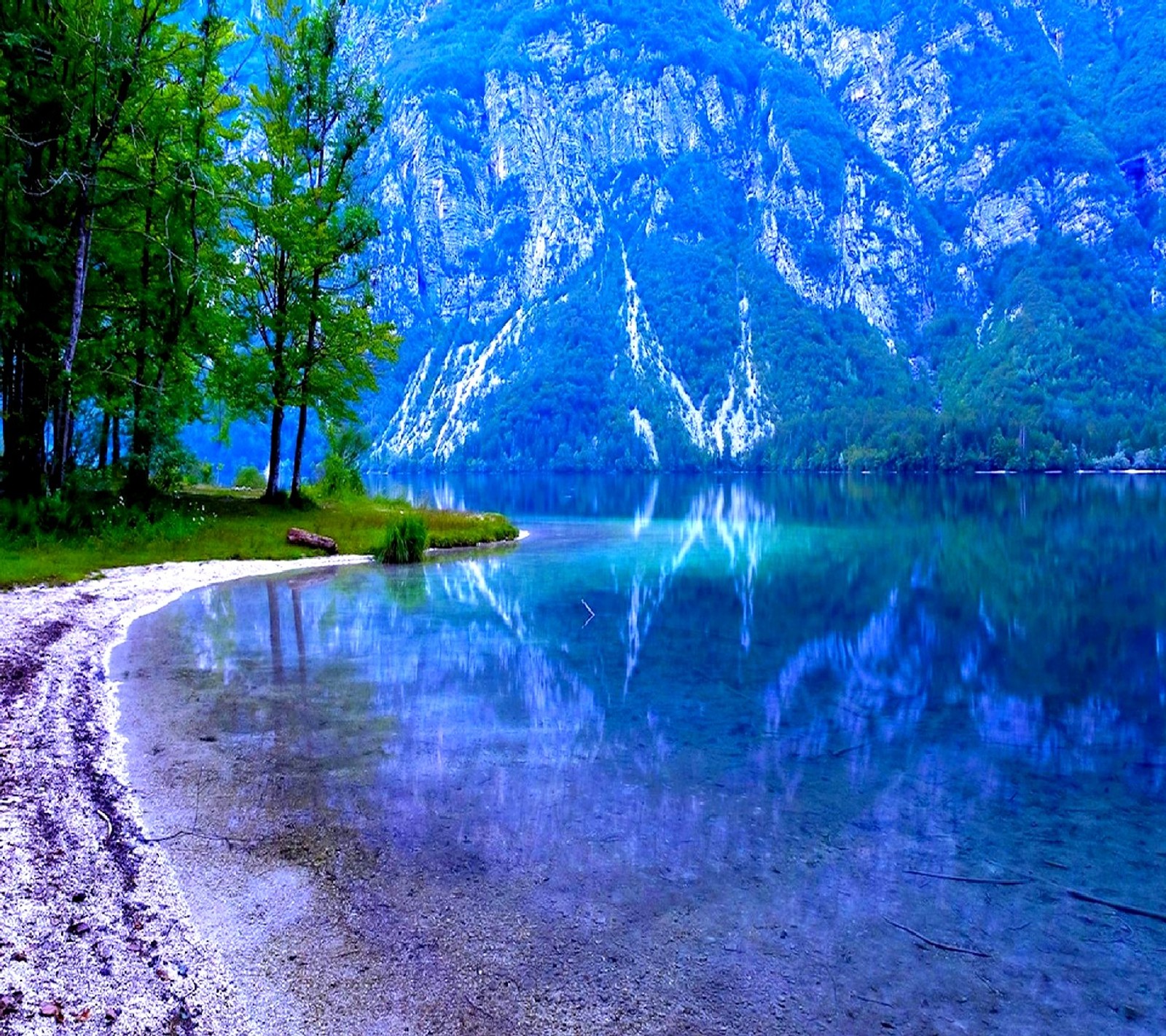 There is a lake with a mountain in the background (nature)