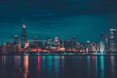 Chicago Night Skyline: Illuminated Cityscape Reflections on Water